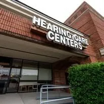 Entrance of a building with a sign that reads 