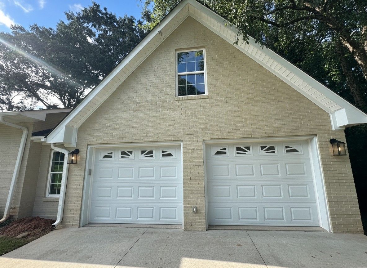 The outside of a closed tan garage