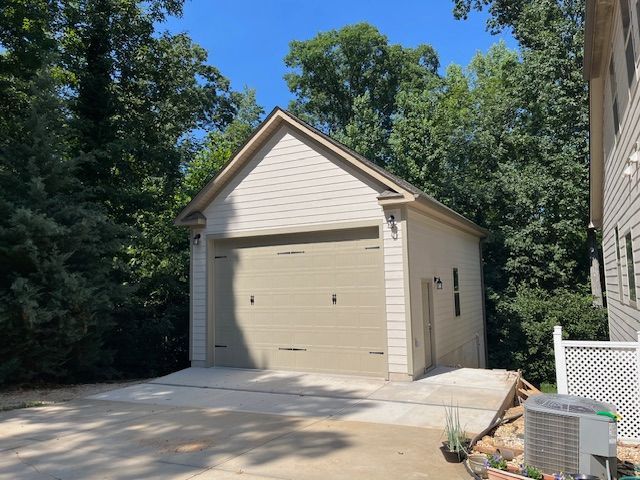 A garage with a driveway