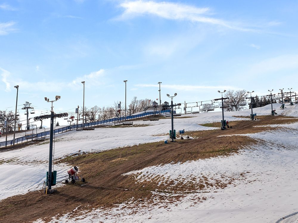 A ski slope with a lot of snow on it