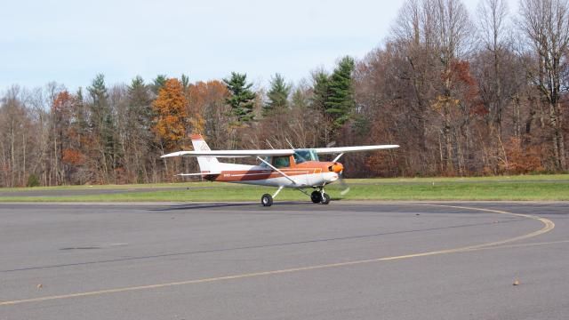 a small plane is sitting on top of an airport runway