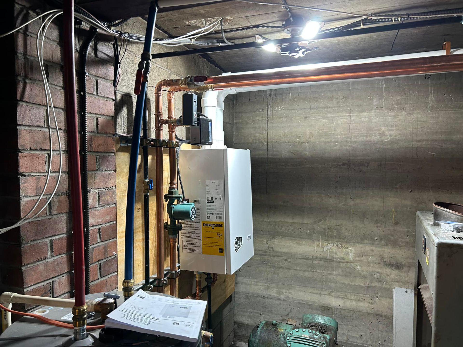 Sand surface with rippled patterns and long shadows.