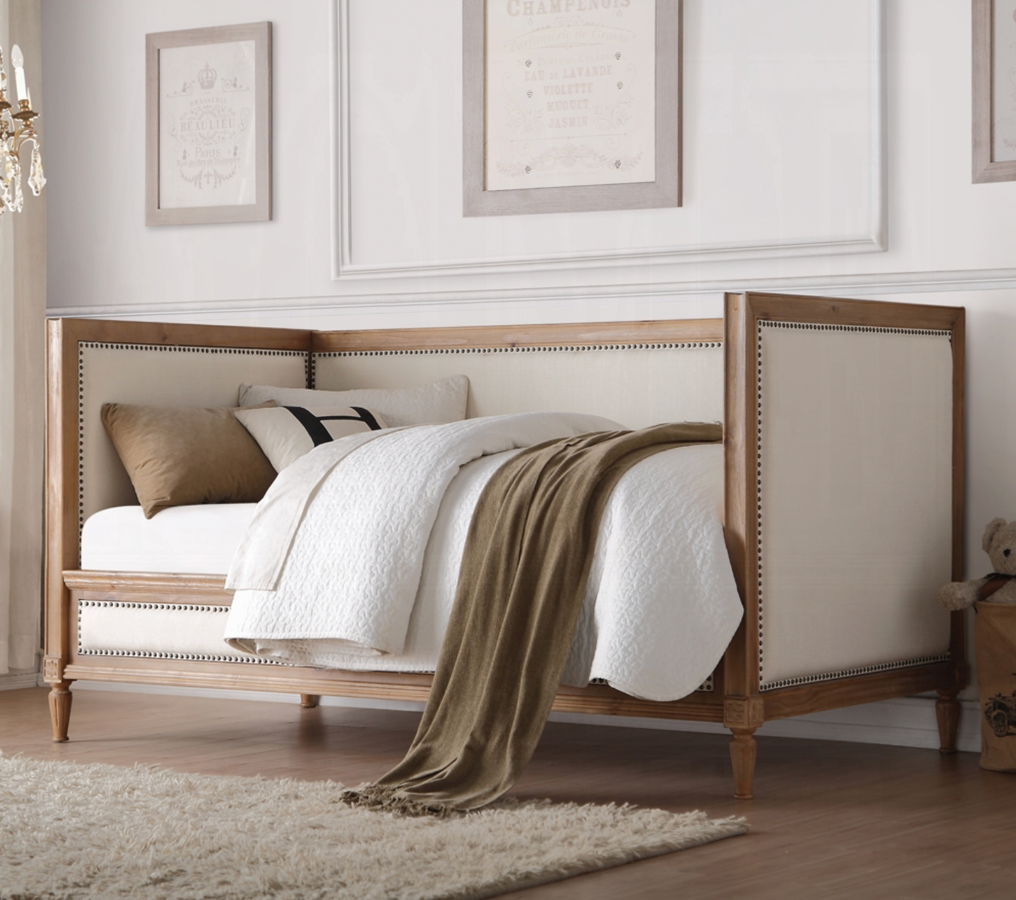 A bunk bed with three beds in a room with blue walls.