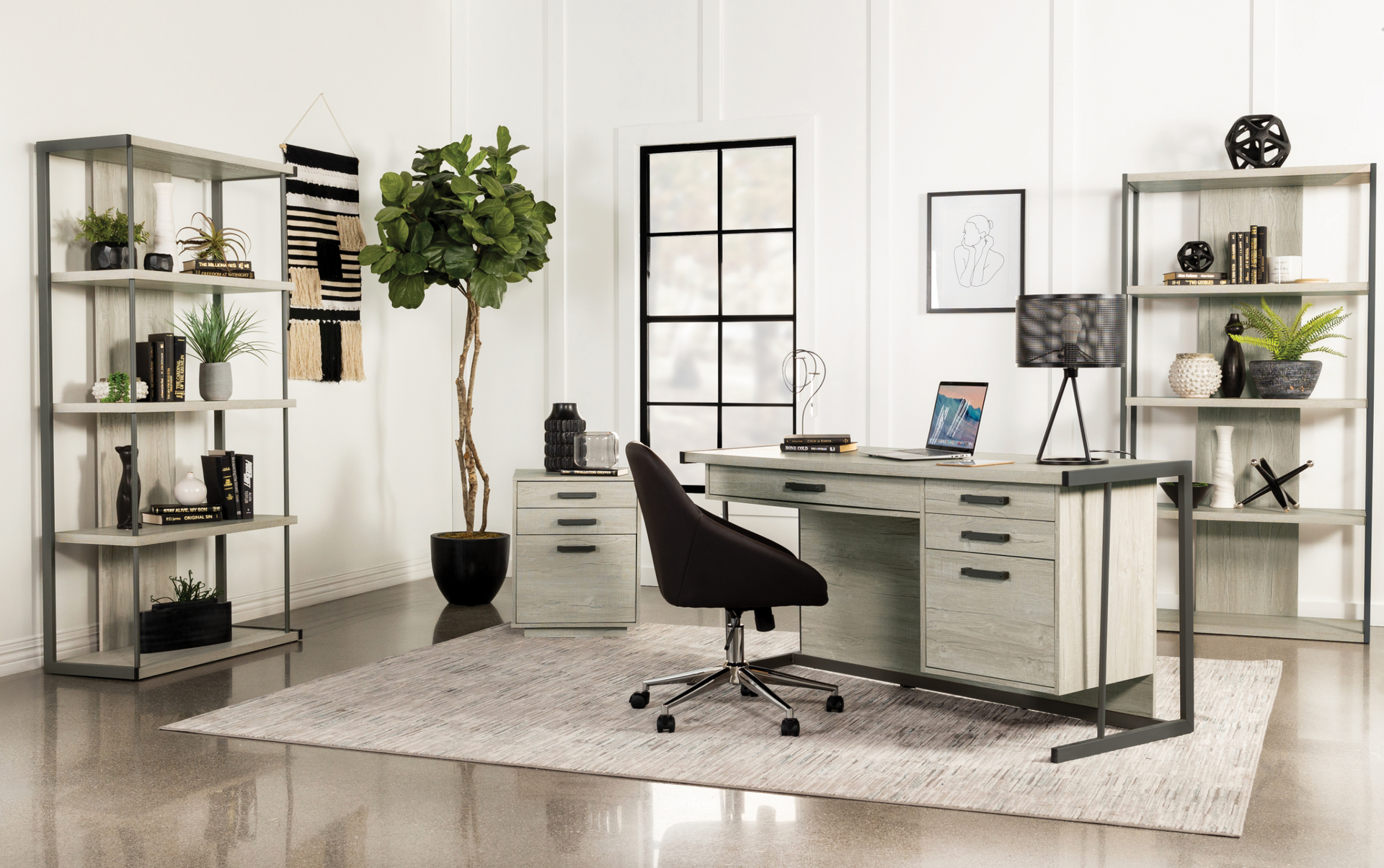 A wooden desk with a globe on top of it in a living room.