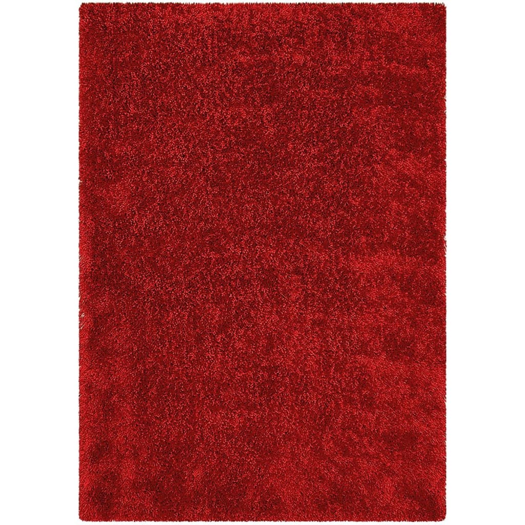 A red rug is sitting on a white surface.