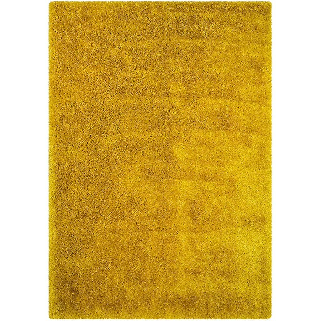 A yellow rug is sitting on a white surface.