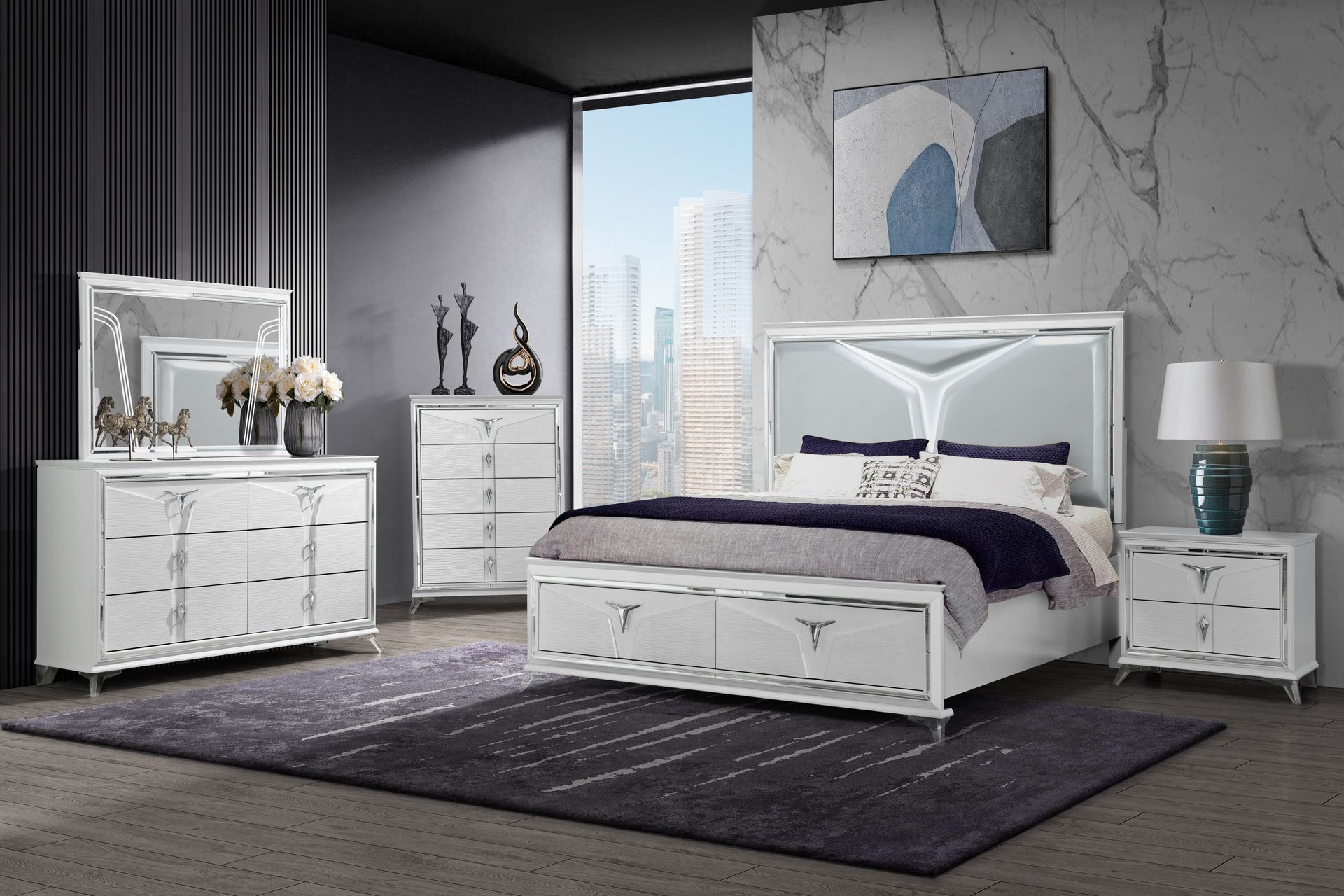 A bedroom with a bed , dresser , mirror and nightstand.