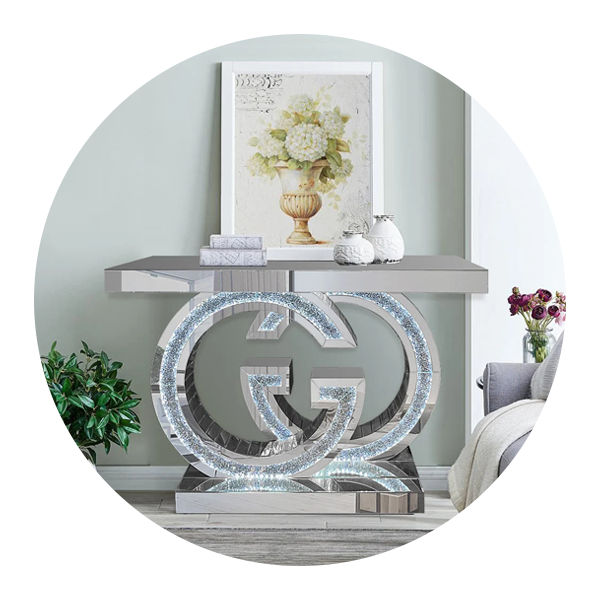 A living room with a couch and a table with a g on it