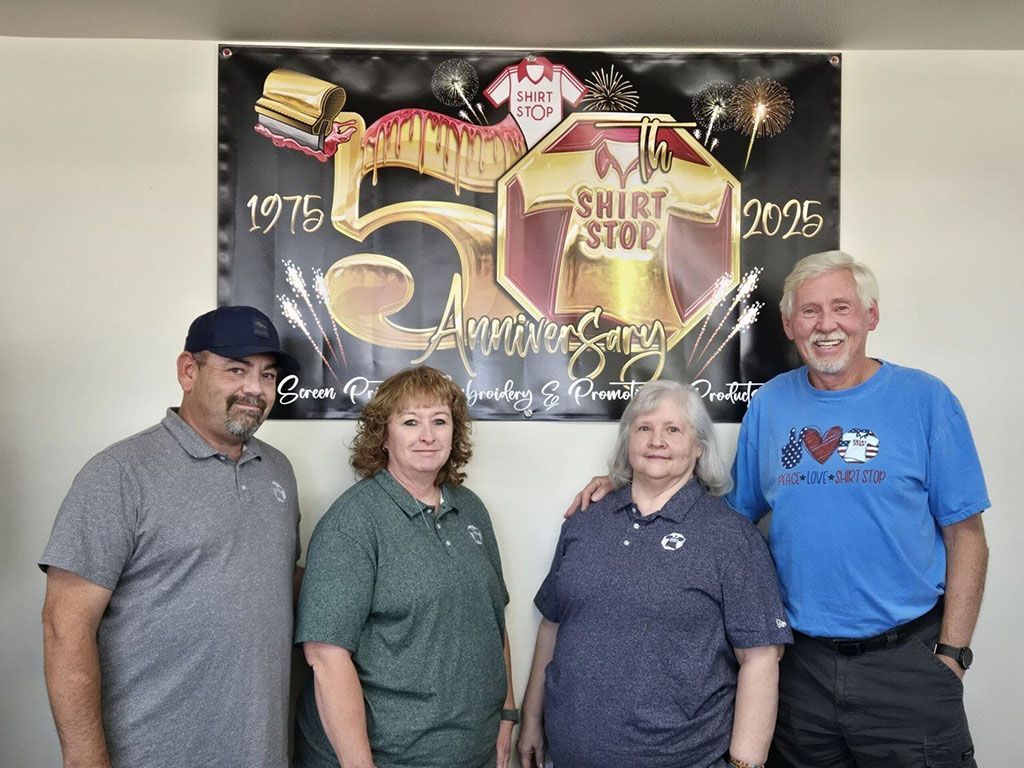 Shirt Stop, a family-owned and operated custom screen printing and embroidery company, is celebrating its 50th anniversary in Colorado Springs in 2025. Pictured from left: Employee Eric Davenport, co-owners Michelle Davenport and Linda Williams, and founder Steve Fredrick. (Photo by Breeanna Jent/The Gazette)