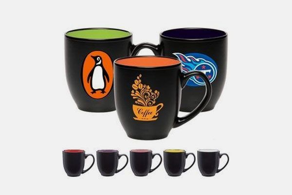 A group of coffee mugs with different designs on them