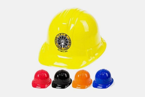 A yellow hard hat with a wheel on it
