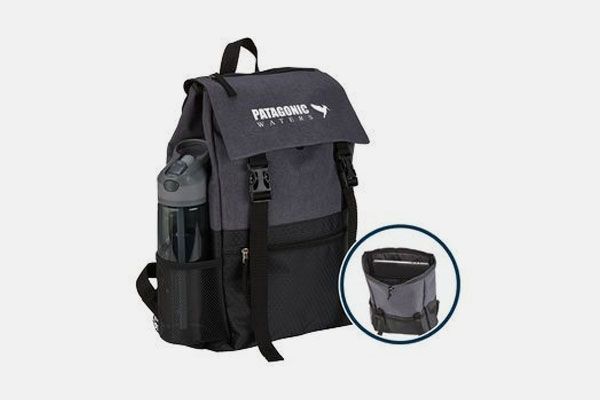 A black backpack with a water bottle in it
