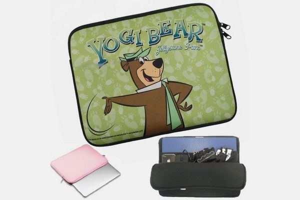 A yogi bear laptop case with a phone in it