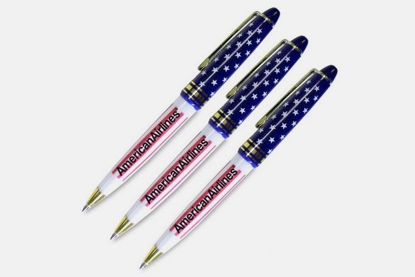 Three american flag pens on a white background