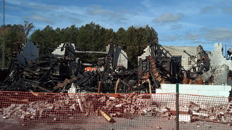 fence around the demolished commercial property