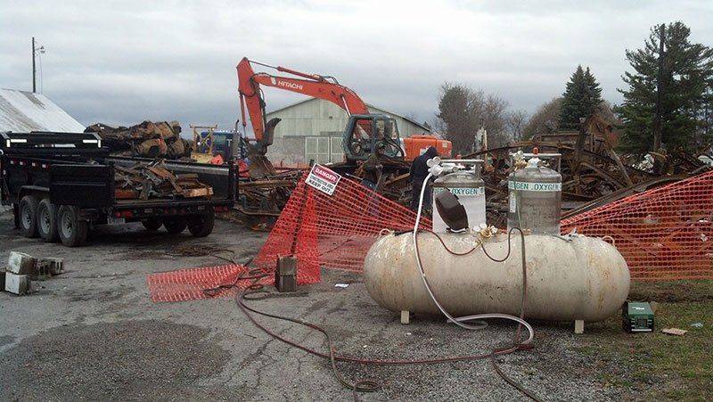 white tank in the demolition site