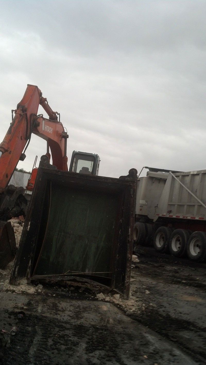 demolition equipment and service truck