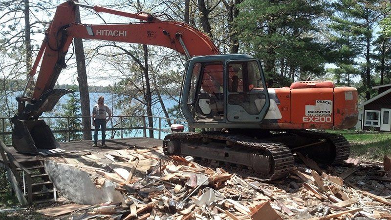 crew overseeing the demolition work
