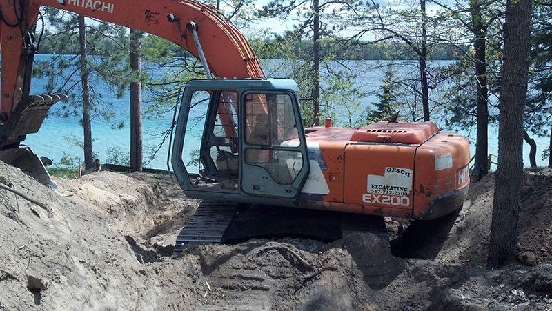 heavy equipment by the lake
