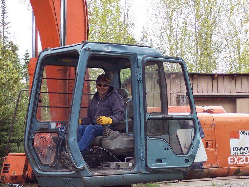 cabin demolition equipment and crew