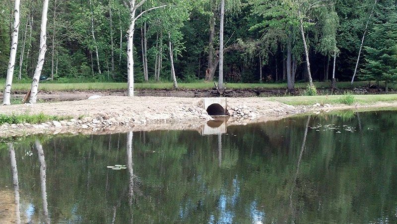 pond shoreline reconstruction service
