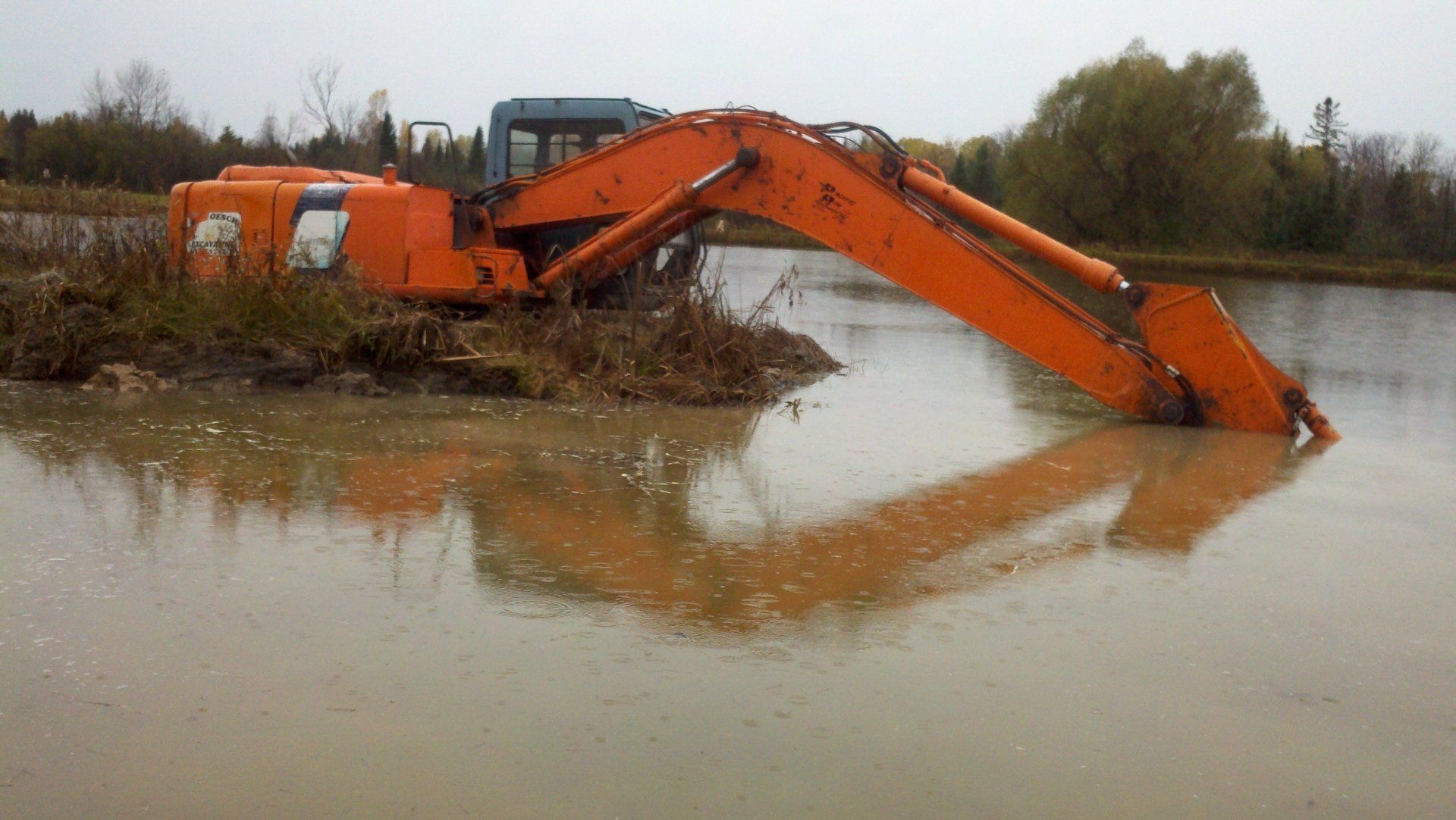 heavy-duty equipment near the pond