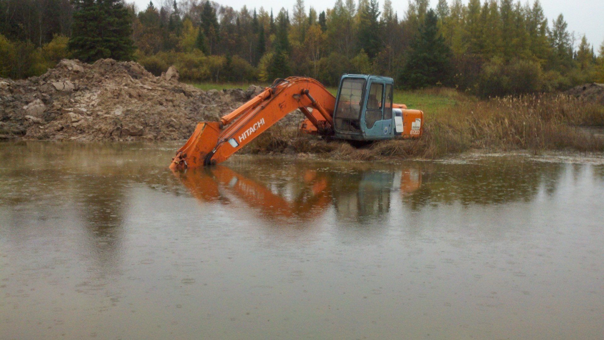 heavy equipment near the pond