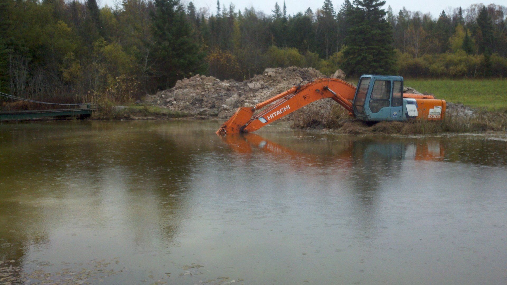 heavy equipment by the pond