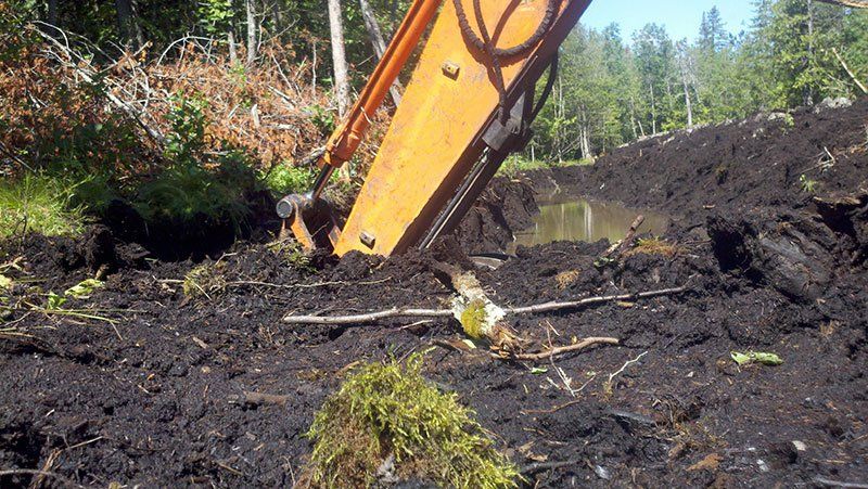 wet land trenching work