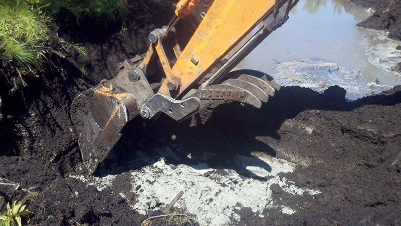 heavy-duty equipment trenching wet land