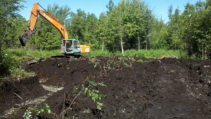 heavy equipment near the trench