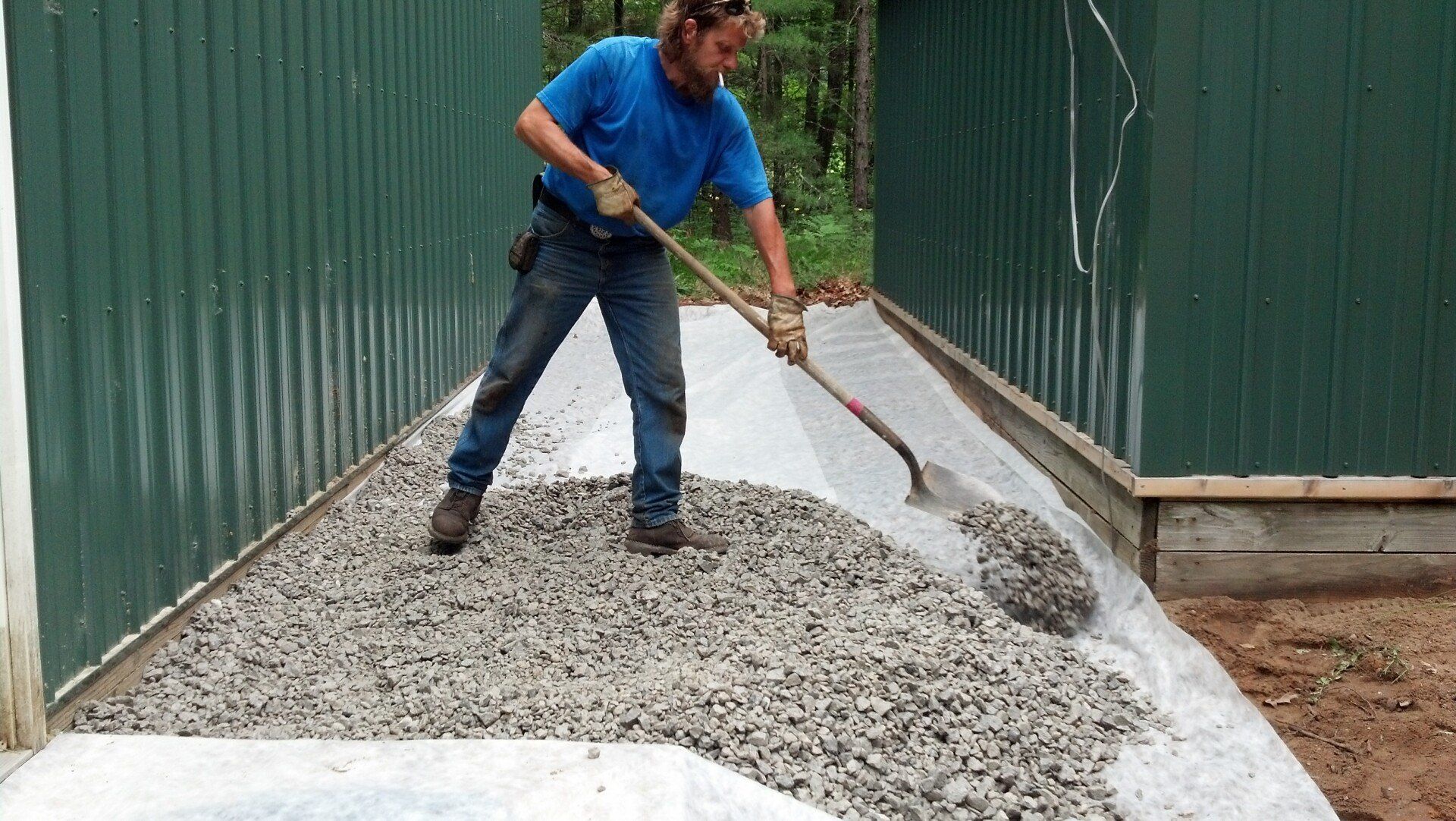 landscaping contractor shoveling