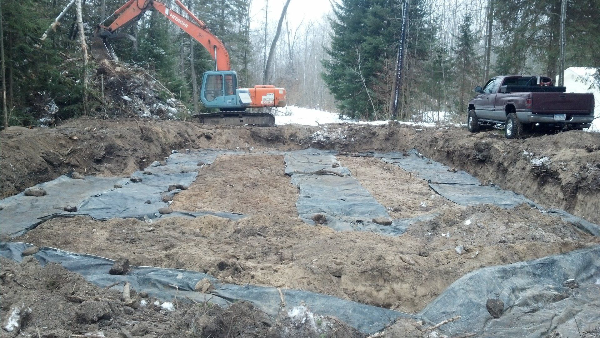 heavy equipment and truck for lot clearing services