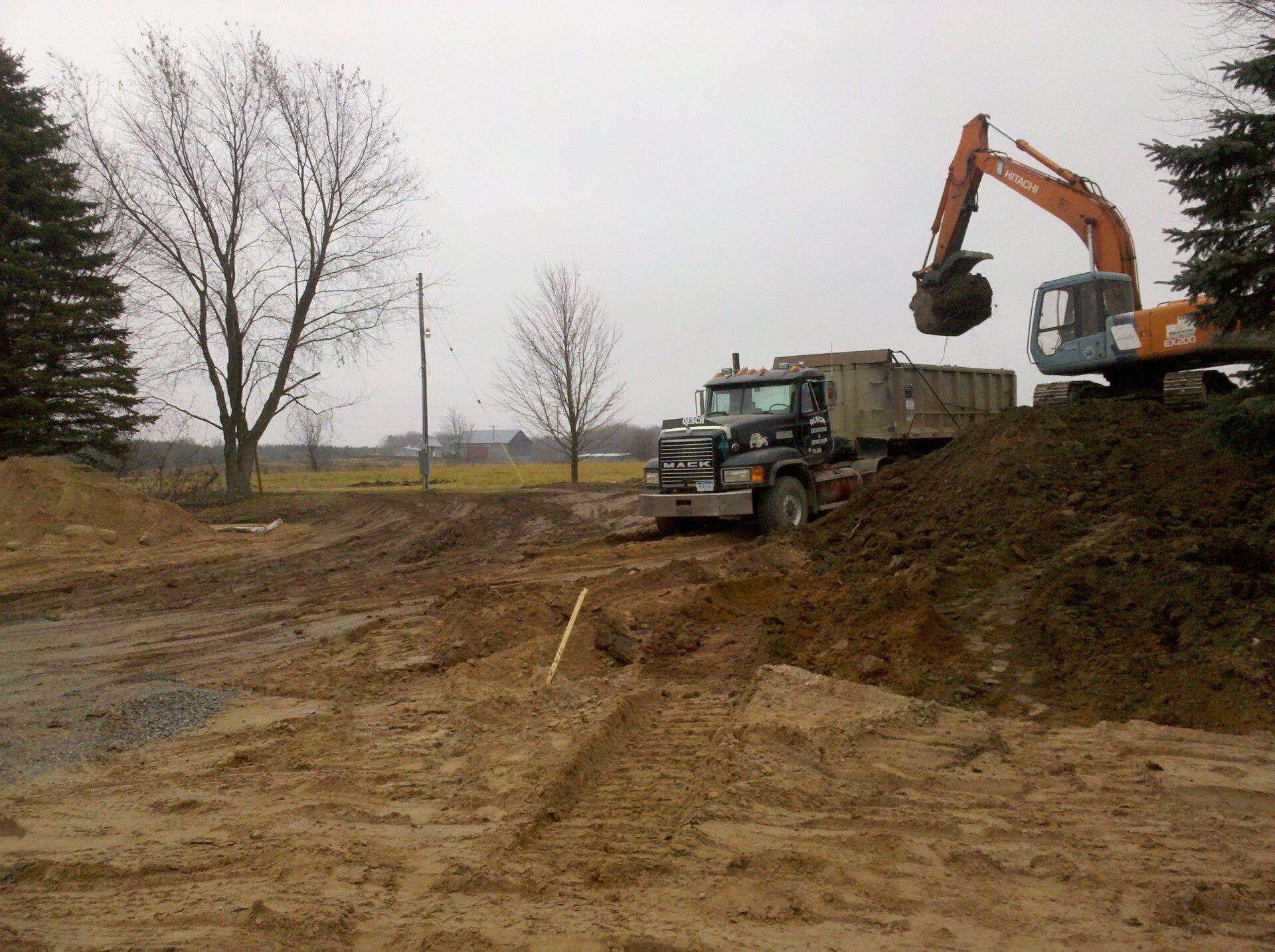 truck and equipment moving soil