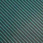 Diagonal lines in teal and dark teal create a striped pattern.