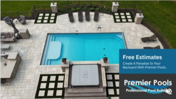 Person applying grout to blue mosaic tiles in a pool.