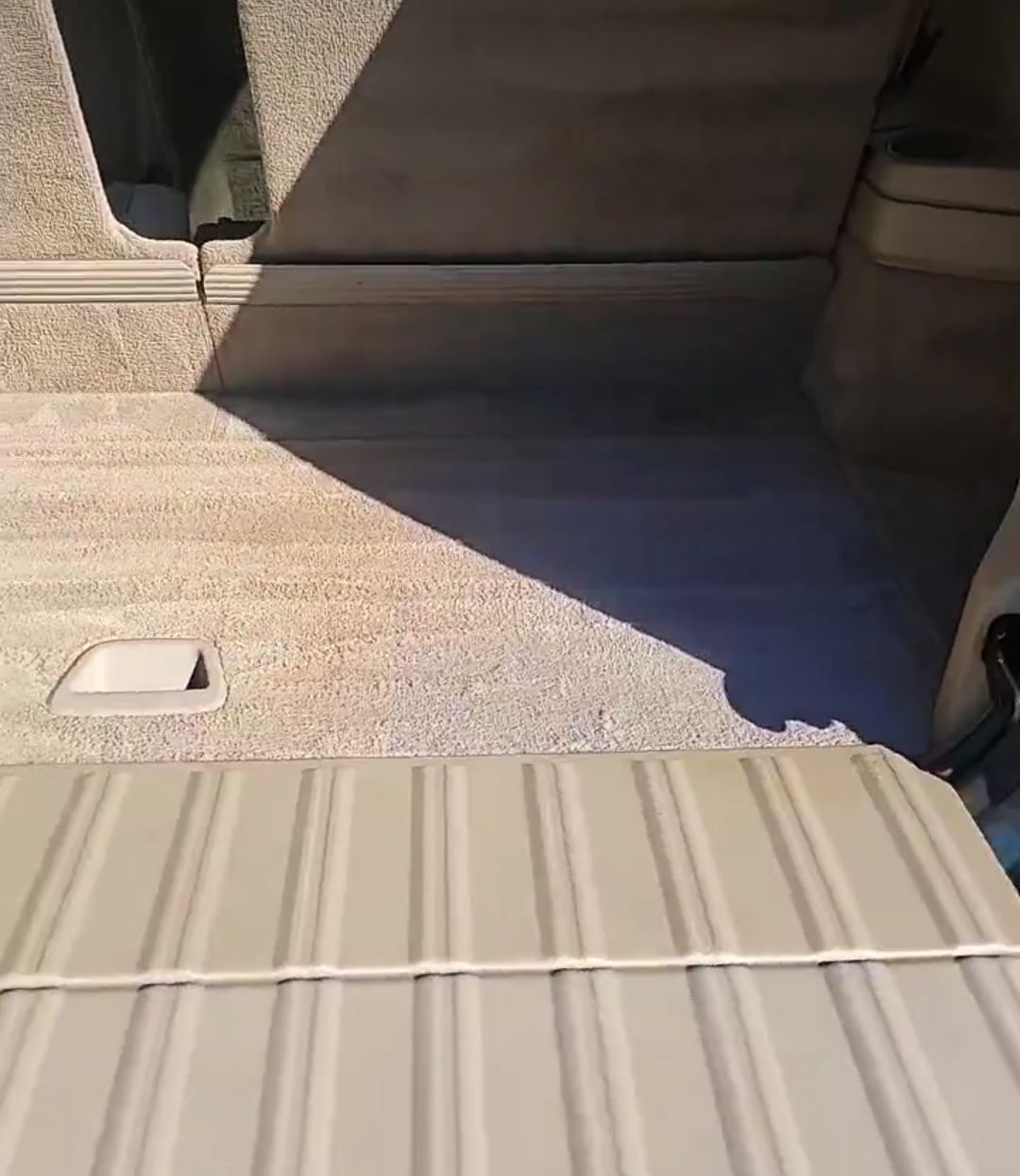 the back of a car with the trunk open