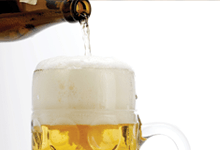 Close up of beer being poured into a glass