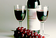 Bottle of domestic wine and grapes