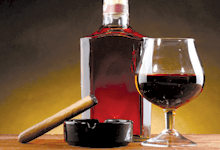 Bottle of alcohol and cigarette