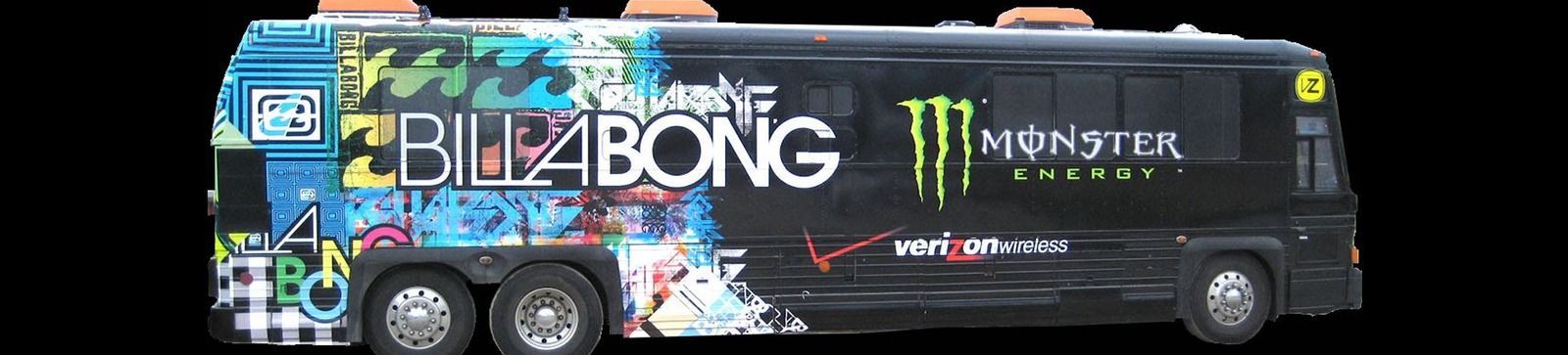 Black bus with Billabong and Monster Energy logos.
