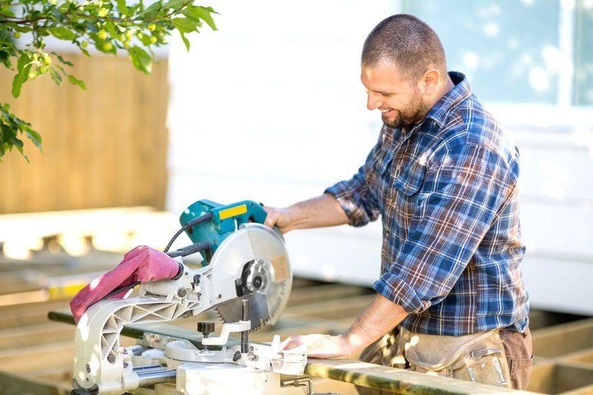 Carpenter cutting wood