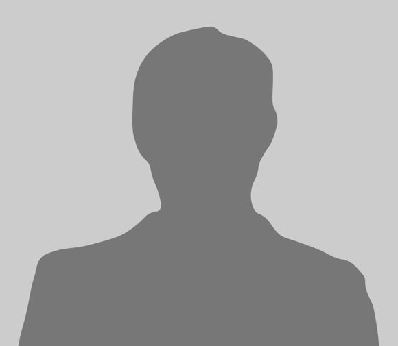 A silhouette of a man without a face on a gray background.