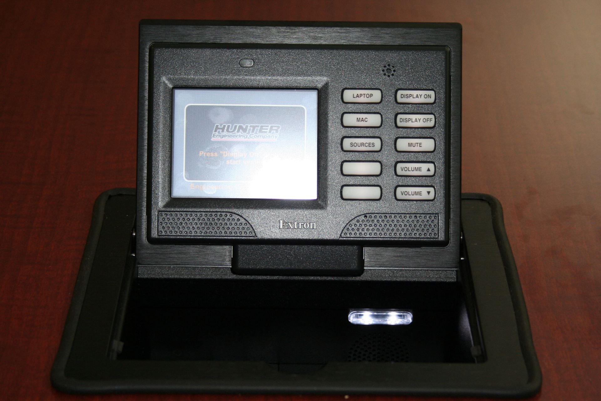 A black device with a screen that says ' manpower ' on it