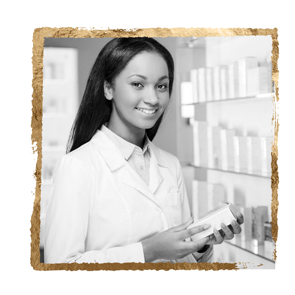 Pharmacist holding a box in a pharmacy, smiling, white lab coat