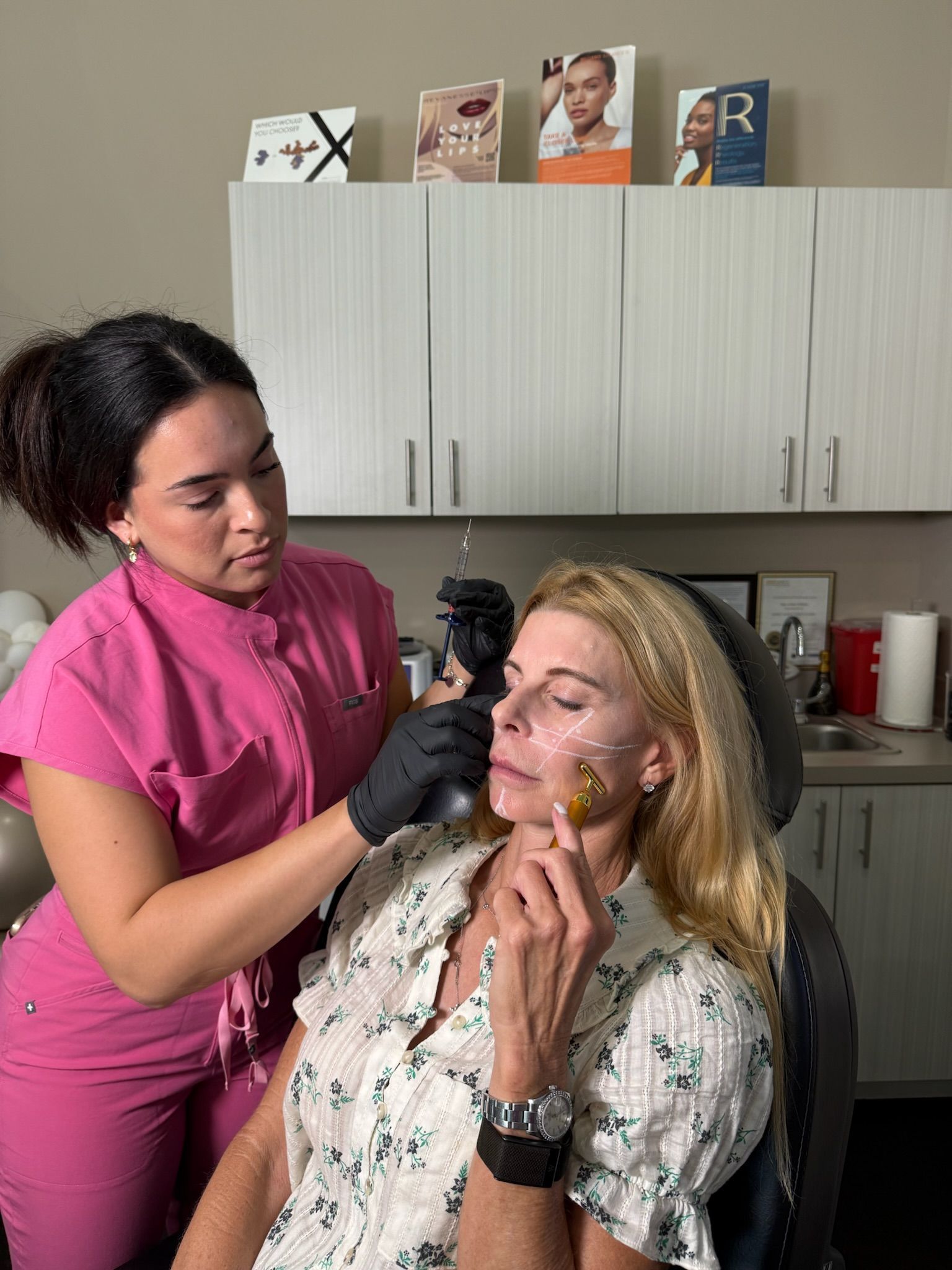 A student practices a supervised facial injection technique during hands-on cosmetic injectable training in Coppell, TX 