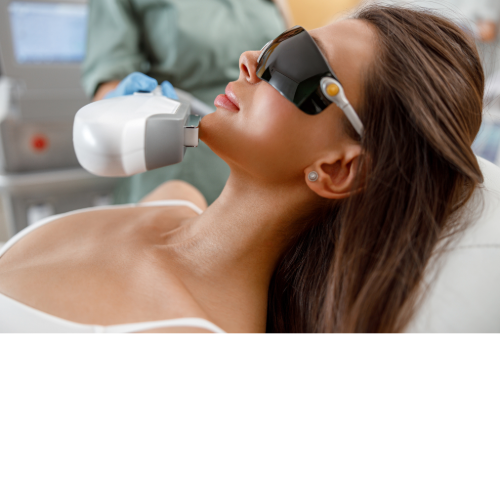 Woman receiving laser skin treatment on her face while wearing protective eyewear.