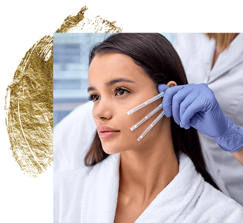 Cosmetic facial treatment with a clinician applying marks to a woman's cheek using a gloved hand