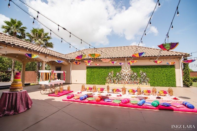 A large house with a lot of colorful decorations in front of it.
