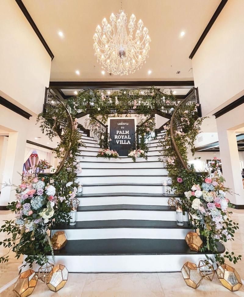 The stairs are decorated with flowers and leaves